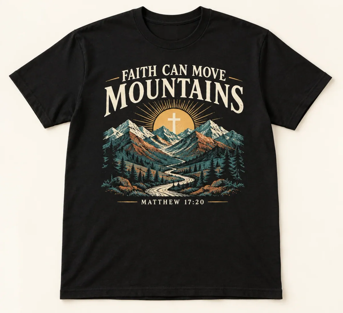 Black t-shirts. A layered mountain landscape, winding trail and rising sun with a cross, paired with Faith Can Move Mountains and Matthew 17:20.